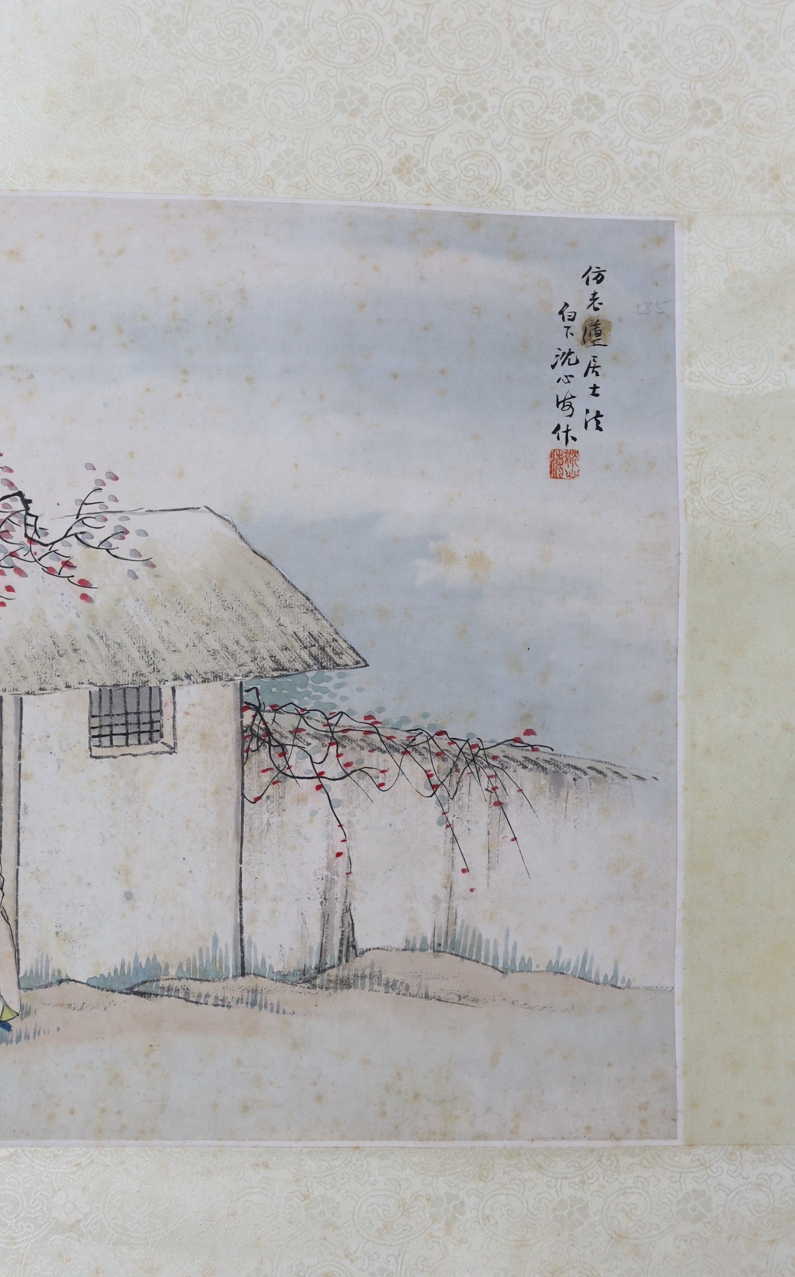 A Chinese scroll painting on paper of a sage and a boy in a hut, early 20th century, image 31.5cm x 42.5cm